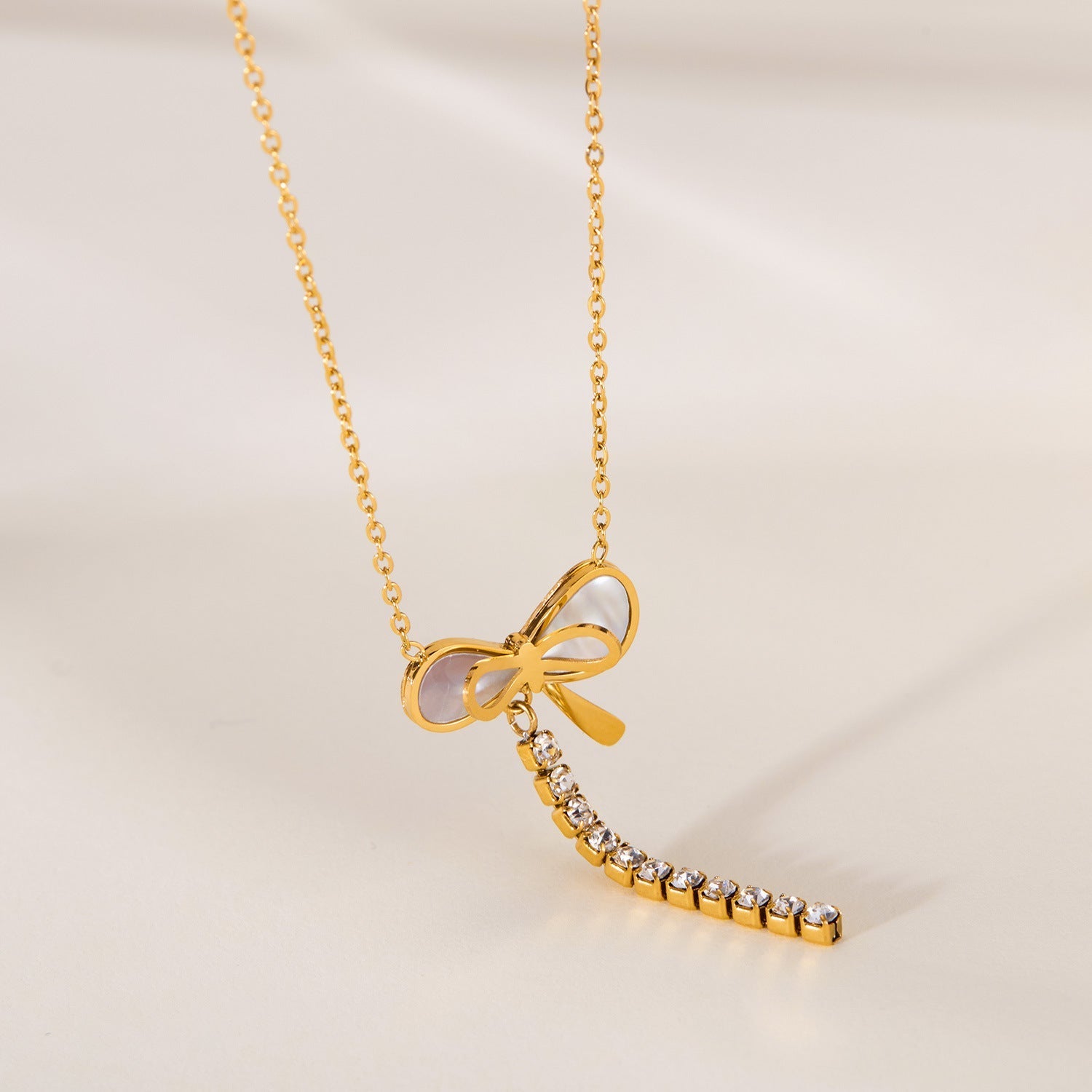 Elegant Titanium Steel Mother Shell Bow Tassel Necklace for Women